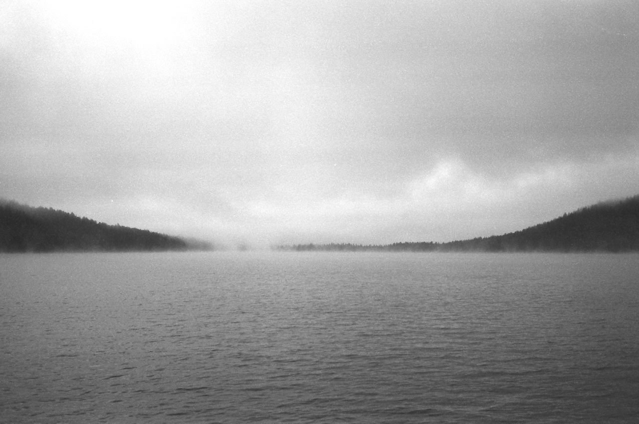 Steam rises off a lake